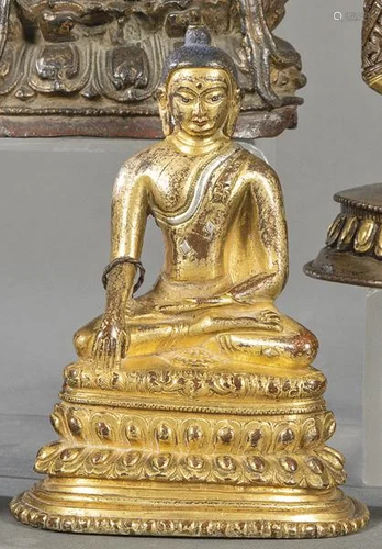 Seated Buddha in gilt and blued bronze, Tibet S. XIX.