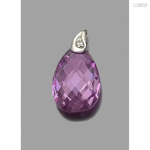 Silver drop pendant adorned with a pear-shaped purple