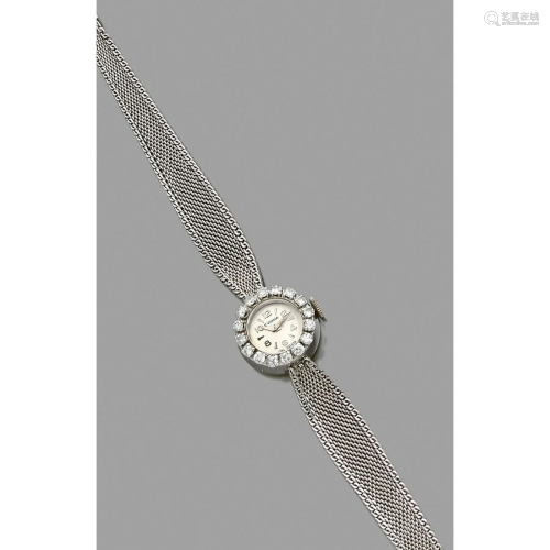 EVIANA. Round-shaped 18k white gold lady's wristwatch.