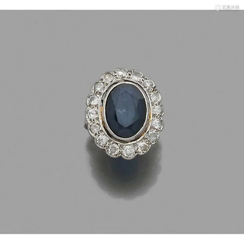 Platinum ring adorned with an oval sapphire in an