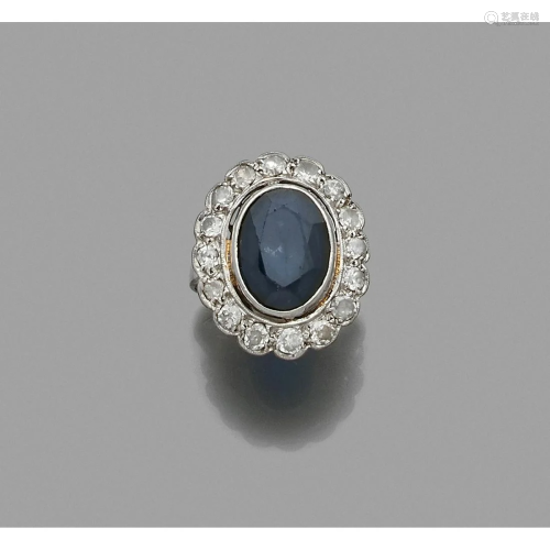 Platinum ring adorned with an oval sapphire in an