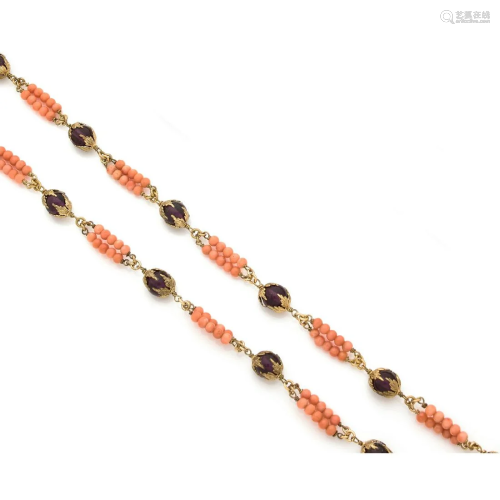 Gold metal long necklace adorned with coral balls and