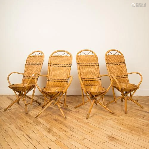 A SET OF FOUR FRENCH MCM RATTAN CHAIRS