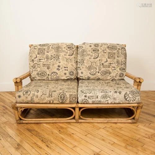 A FRENCH SQUARE BACK TWO SEAT RATTAN SOFA