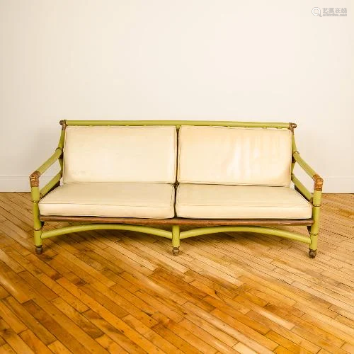 A FICKS REED RATTAN TWO SEAT GREEN SOFA