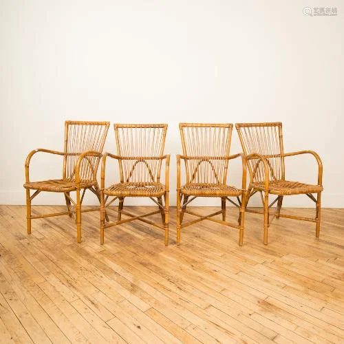 A SET OF FOUR FRENCH MCM FRENCH RATTAN CHAIRS