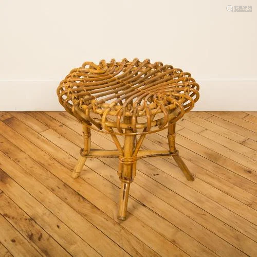 AN ITALIAN ROUND RATTAN STOOL OR END TABLE