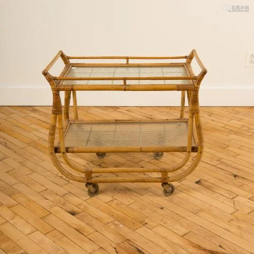 FRENCH RATTAN AND GLASS DRINKS CART CIRCA 1950.