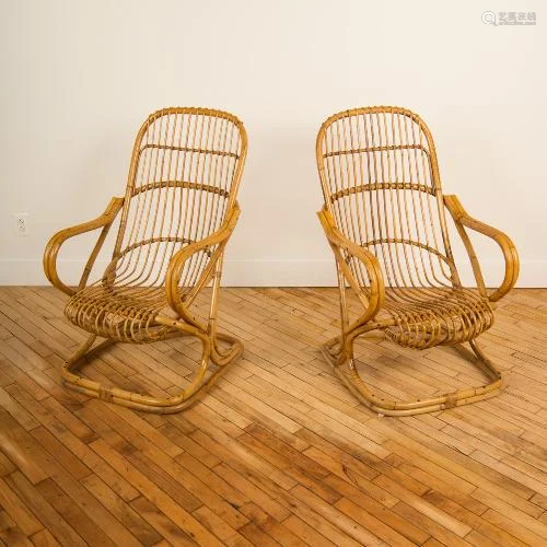 A PAIR OF ITALIAN RATTAN LOUNGE ARM CHAIRS