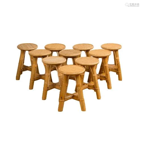 A SET OF TEN BAMBOO AND RATTAN STOOLS.