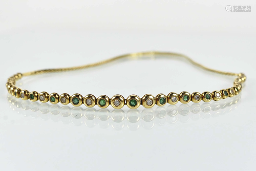 Gold necklace with diamonds and emeralds