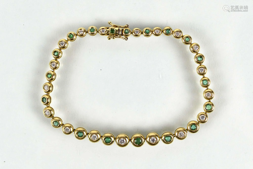 Gold bracelet with diamonds and emeralds