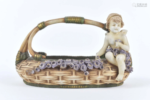 Porcelain basket with cherub