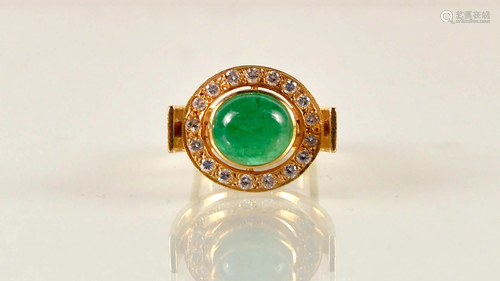 Women's gold ring with emerald and diamonds,