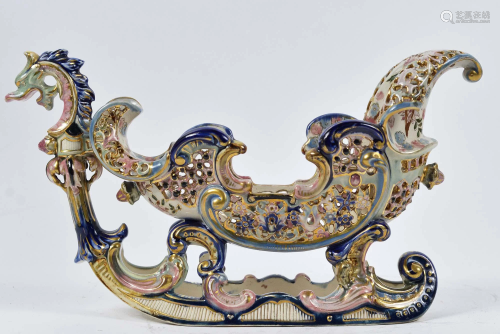 Fischer, J. - Porcelain sleigh with dragon figure -