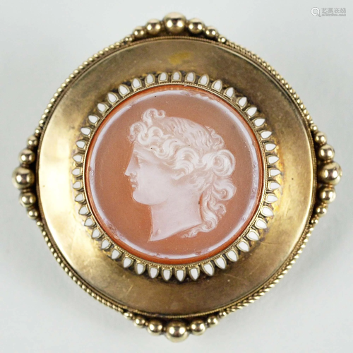 14kt mourning brooch, enameled and set with a cameo -