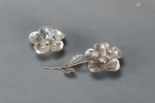 Two silver flowers