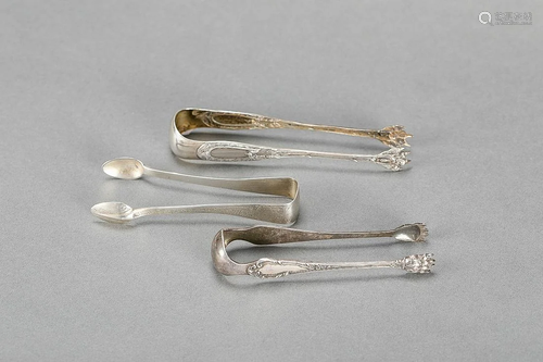 Three silver sugar tongues