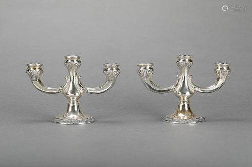 Pair of silver candelabra