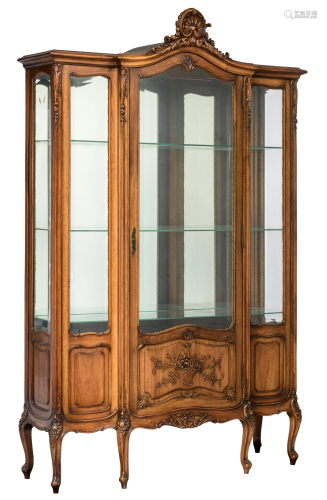 A Rococo style finely carved walnut display cabinet, H
