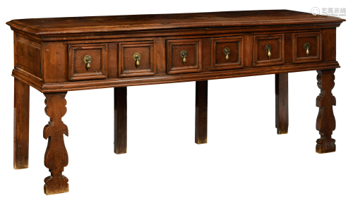 A Jacobean inspired walnut sideboard with three
