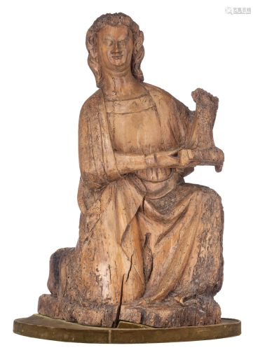A French 14th/15thC limewood sculpture depicting a