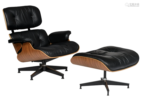 An Eames lounge chair with a matching ottoman, a 90s