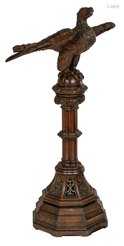 A Gothic Revival richly carved oak church eagle