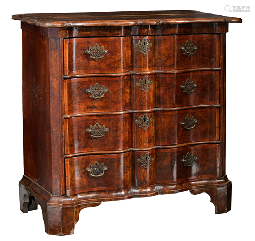 A fine Dutch chest of drawers with a wavy front, the