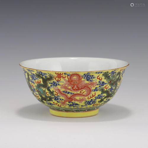 FAMILLE ROSE DRAGONS ON YELLOW GROUND PORCELAIN BOWL