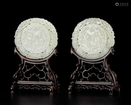 A PAIR OF VERY PALE GREEN JADE 'WEDDING FIGURES' CIRCULAR SC...