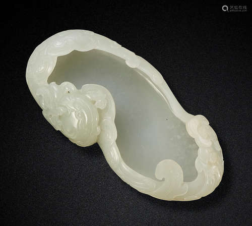 A VERY PALE GREEN JADE 'PHOENIX' WASHER 18th century