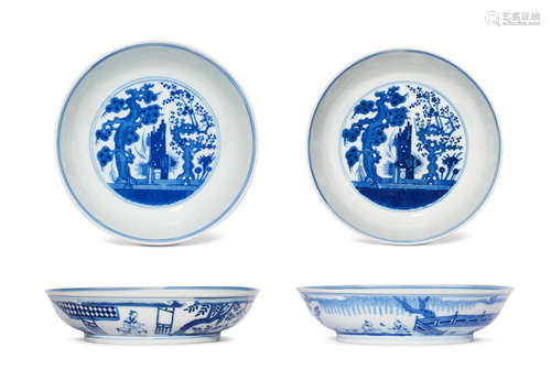 A PAIR OF BLUE AND WHITE 'LADY AND BOYS' SAUCER-DISHES Guang...