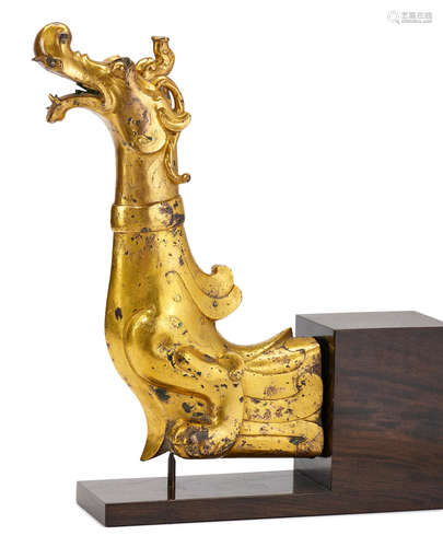 AN IMPORTANT AND VERY RARE LARGE GILT-BRONZE 'DRAGON' TERMIN...