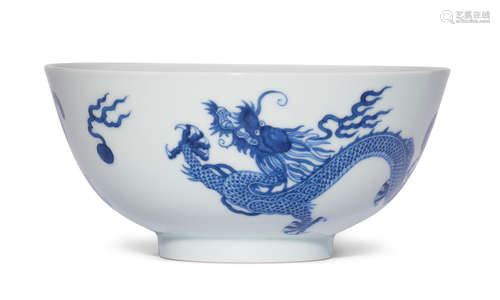 A BLUE AND WHITE 'DRAGON' BOWL Kangxi six-character mark and...