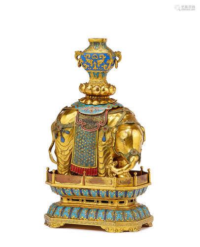 AN IMPERIAL GILT-BRONZE, CLOISONNÉ AND CHAMPLEVÉ ENAMEL FIGU...