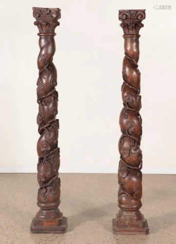 PAIR CARVED AND TWISTED WOOD COLUMNS