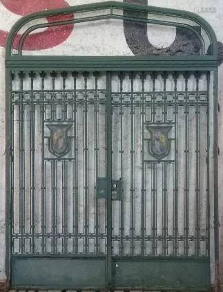 STATELY PAIR IRON GATES IN FRAME WITH TRANSOM 190
