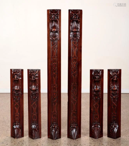SIX CARVED WALNUT ELEMENTS WITH FACES C.1910