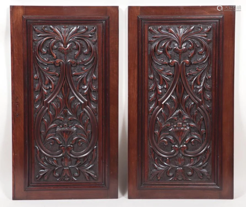 TWO CARVED WALNUT CABINET DOORS CIRCA 1910