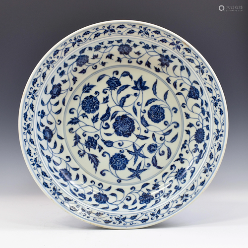 MING YONGLE BLUE AND WHITE WRAPPED FLORAL PLATE