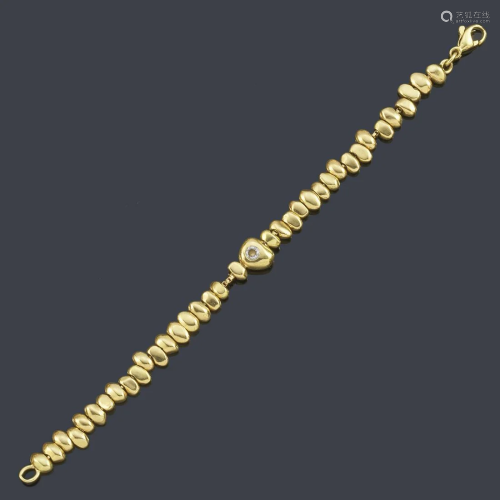 Bracelet with nugget-shaped motifs in 18K yellow gold