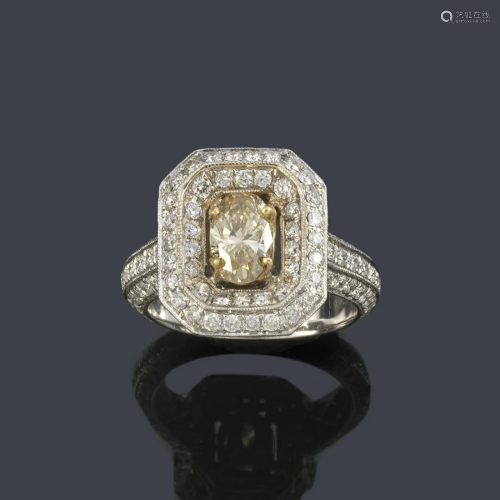 Ring with fancy yellow oval cut diamond of approx. 0.70