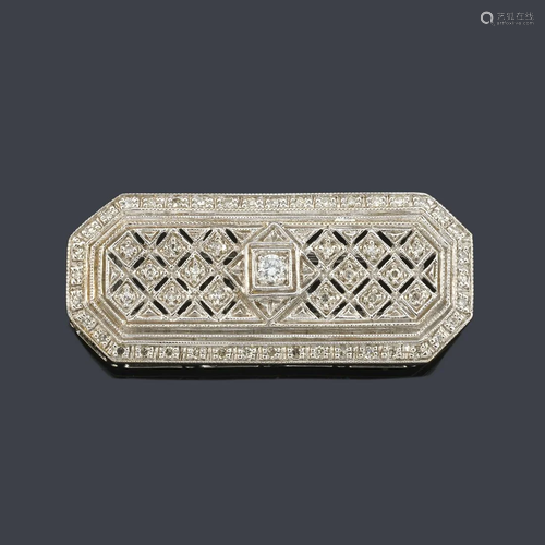 Octagonal brooch with openwork motifs with simple and