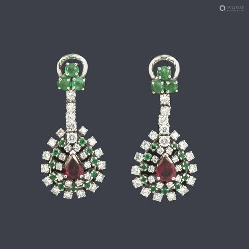 Long earrings with a pair of goatee-cut rubies of