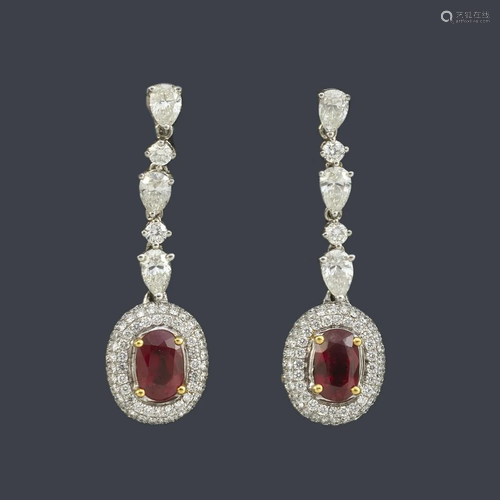 Long earrings with a pair of oval cut rubies of approx.