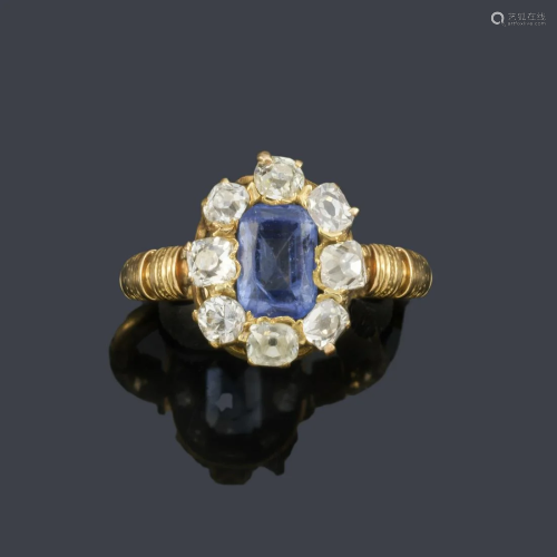 Ring with Ceylon sapphire and antique cut diamond