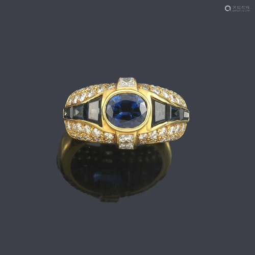 Ring with oval cut sapphires and calibrated with