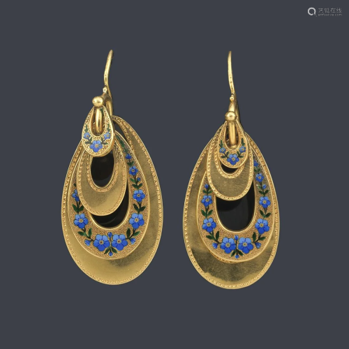 Long earrings with four diminishing oval motifs with