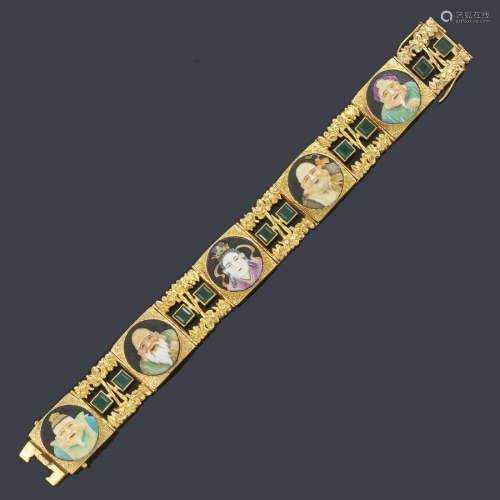 Articulated bracelet with five motifs representing the